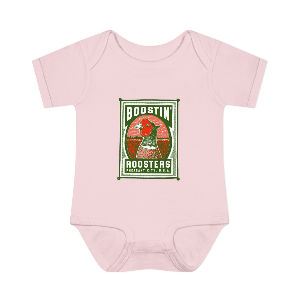 A light pink short-sleeve baby bodysuit featuring a vintage-style graphic print on the chest with a rooster and the text 'BOOSTIN' ROOSTERS'.