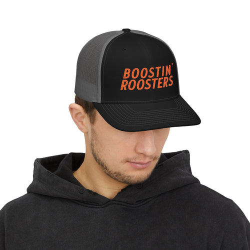 Person wearing a black and gray cap with 'Boostin' Roosters' text on a white background